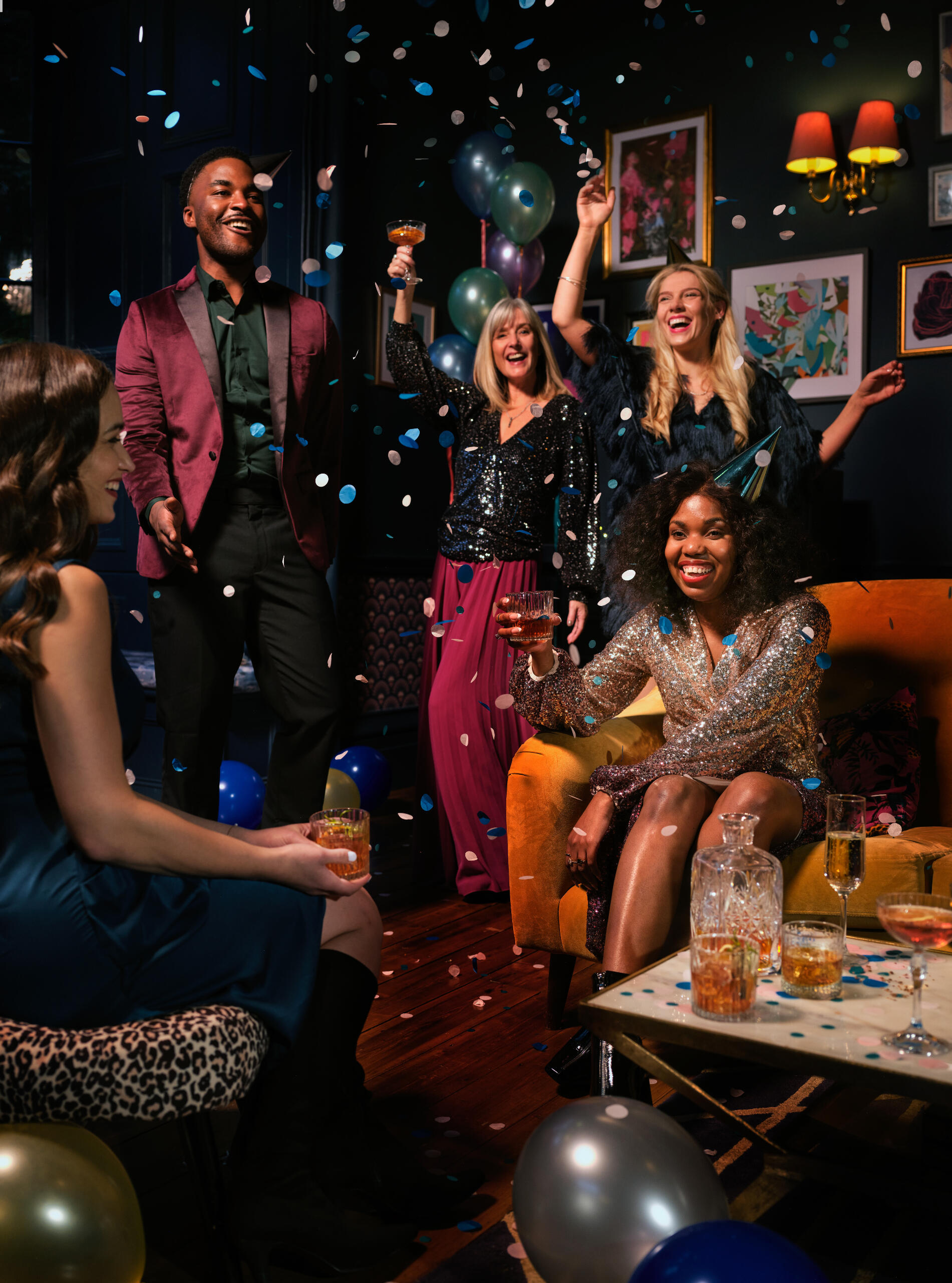 People celebrating and dancing and smiling. Unsplash Credit: OurWhisky Foundation
